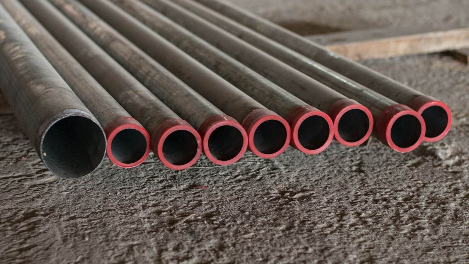 Thompson Trenchless and Hydro Jetting prepares metal pipes for sewer repair, showing equipment ready for service.