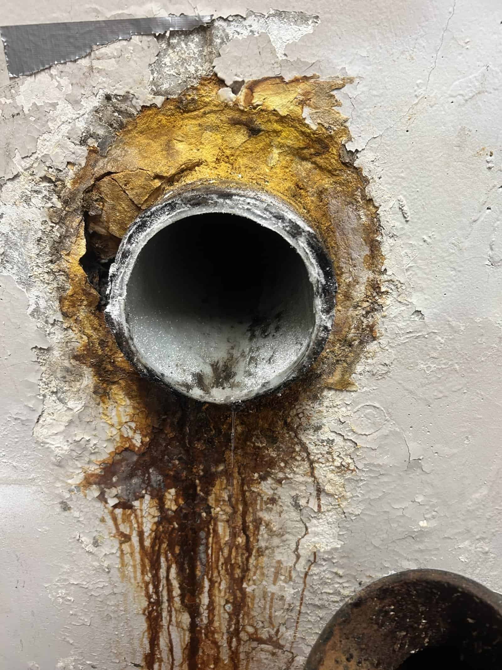 Old pipes needing repair from Thompson Trenchless and Hydro Jetting, showing clear signs before a service is needed.