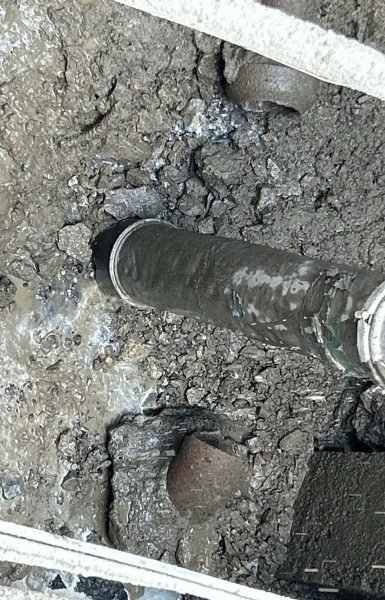 A leaking broken pipe shows why you’d need Thompson Trenchless and Hydro Jetting to fix water and drain issues.